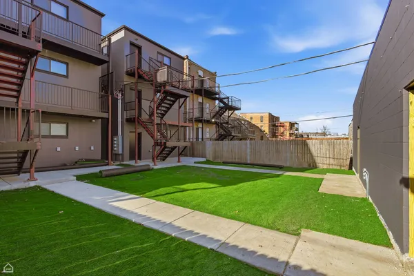 a view of a back yard of the house