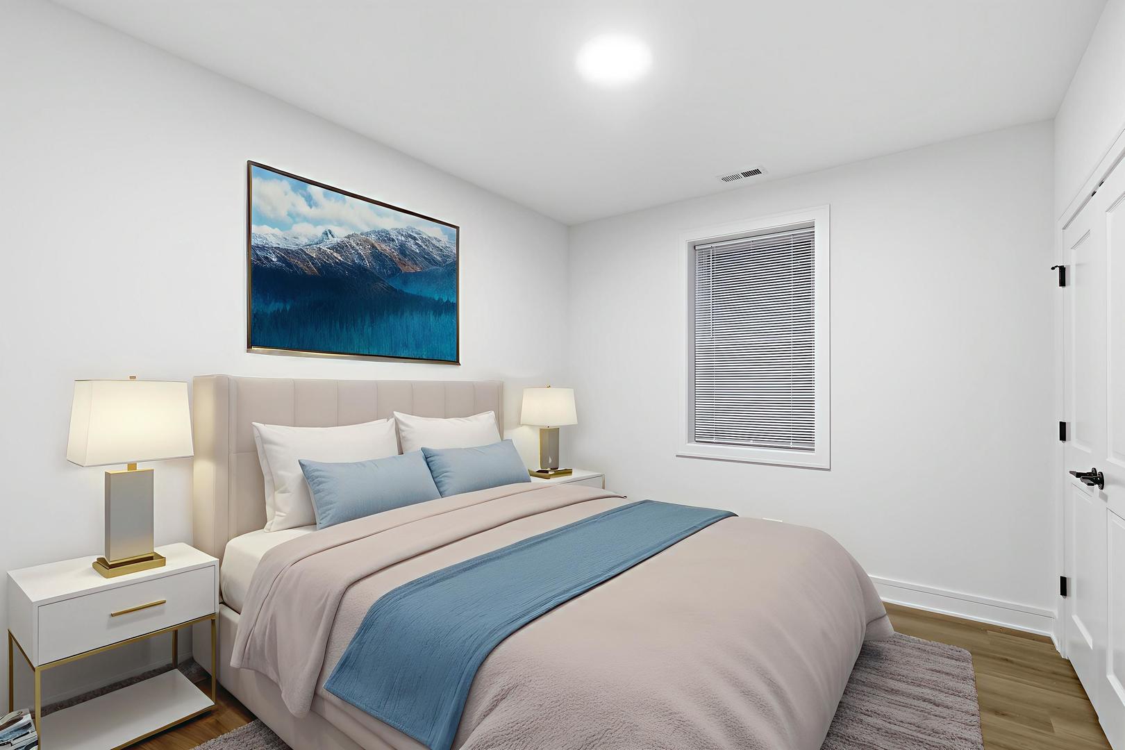 4739 South Indiana Avenue Chicago, IL 60615 - Photo 7 of 38 a bedroom with a bed and a lamp