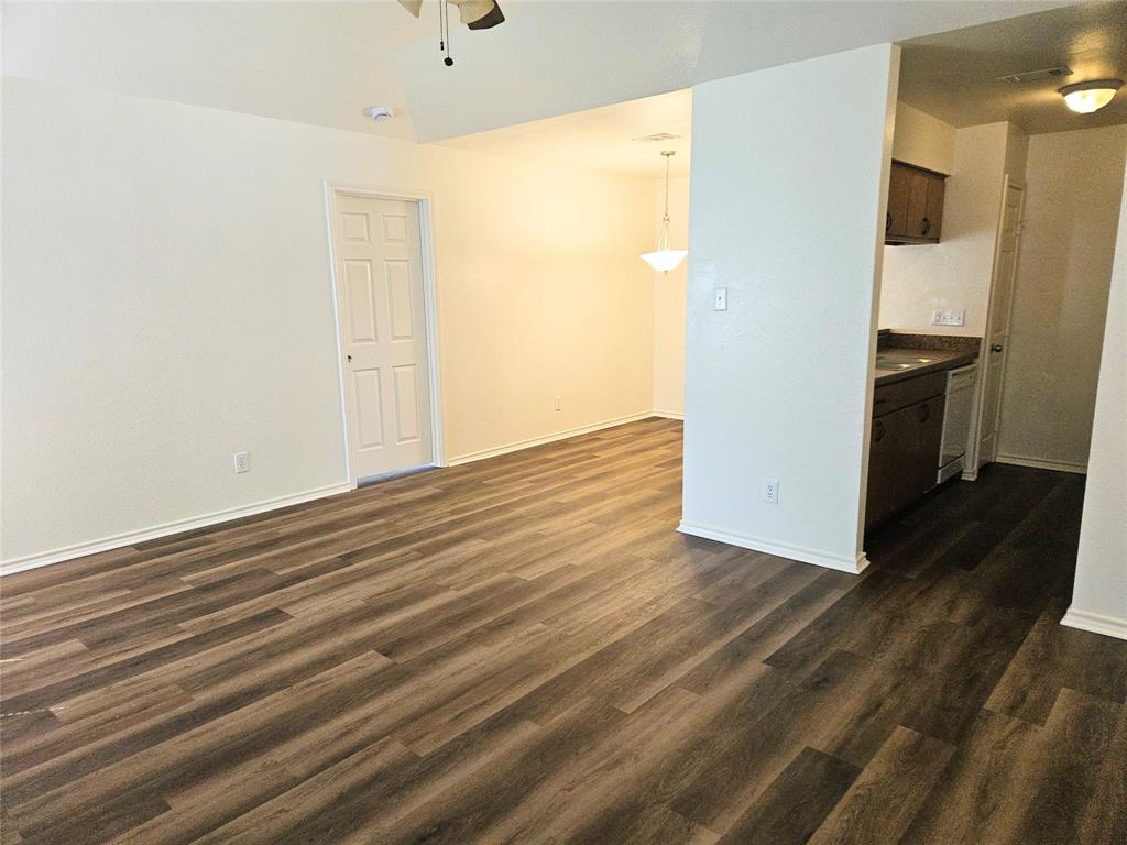 508 East Denton Drive Euless, TX 76039 - Photo 13 of 22 a view of a kitchen with wooden floor