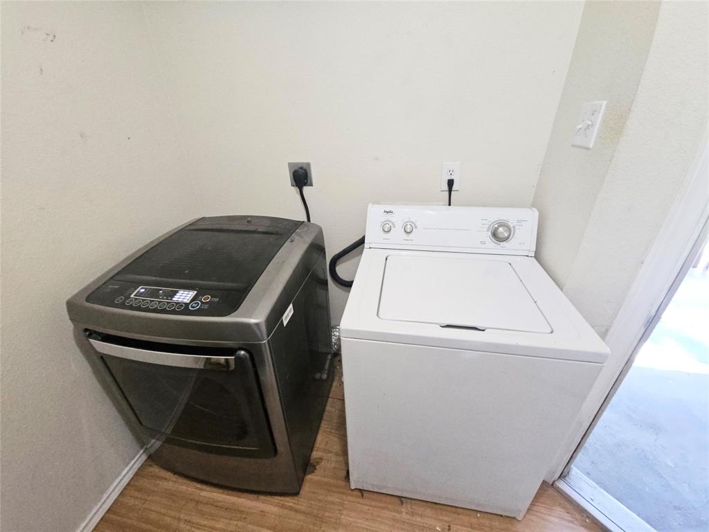508 East Denton Drive Euless, TX 76039 - Photo 22 of 22 a utility room with dryer and washer