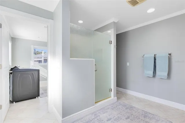 a view of a closet and utility room