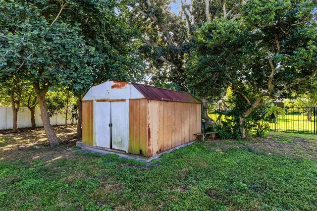 a backyard of a house with lots of green space