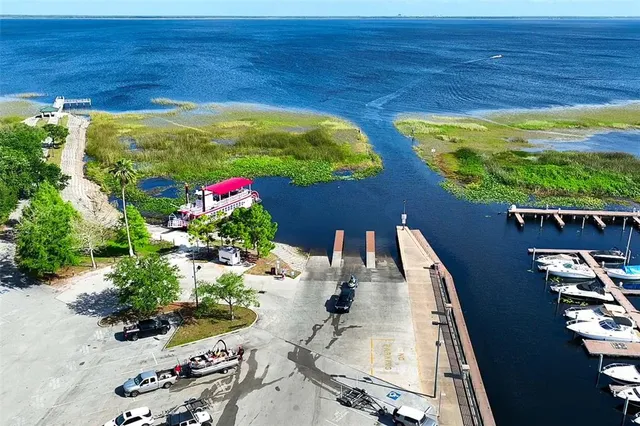 a view of swimming pool with furniture