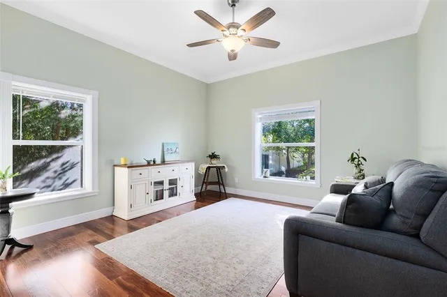 a living room with furniture and a window