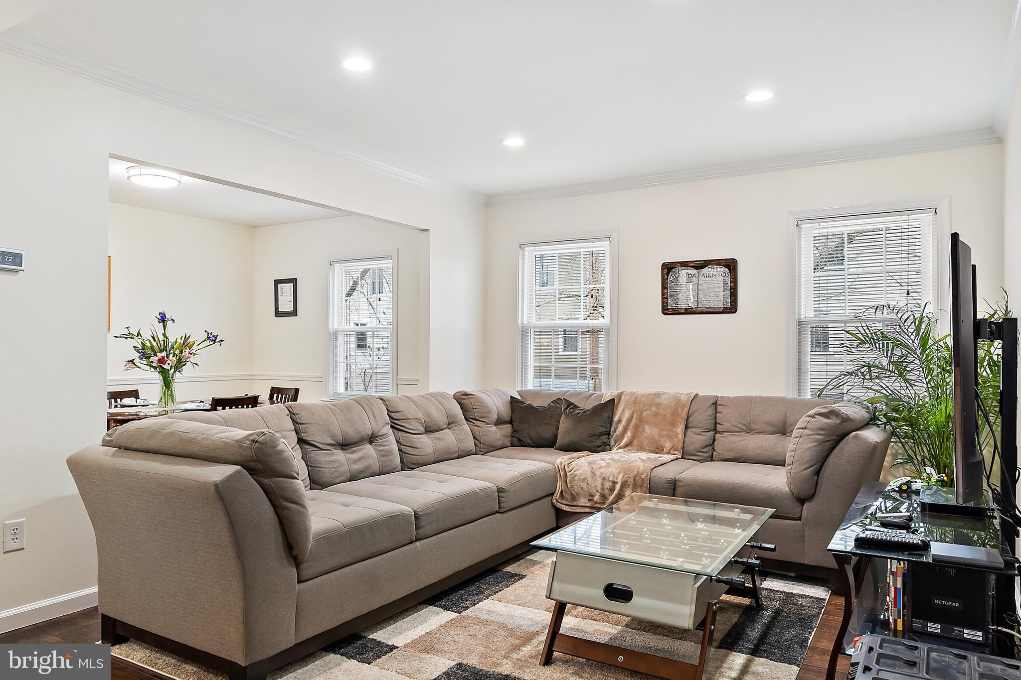 9504 Covington Place Manassas, VA 20109 - Photo 1 of 40 Bright Living Room, with Beautiful LVP Wood Floor