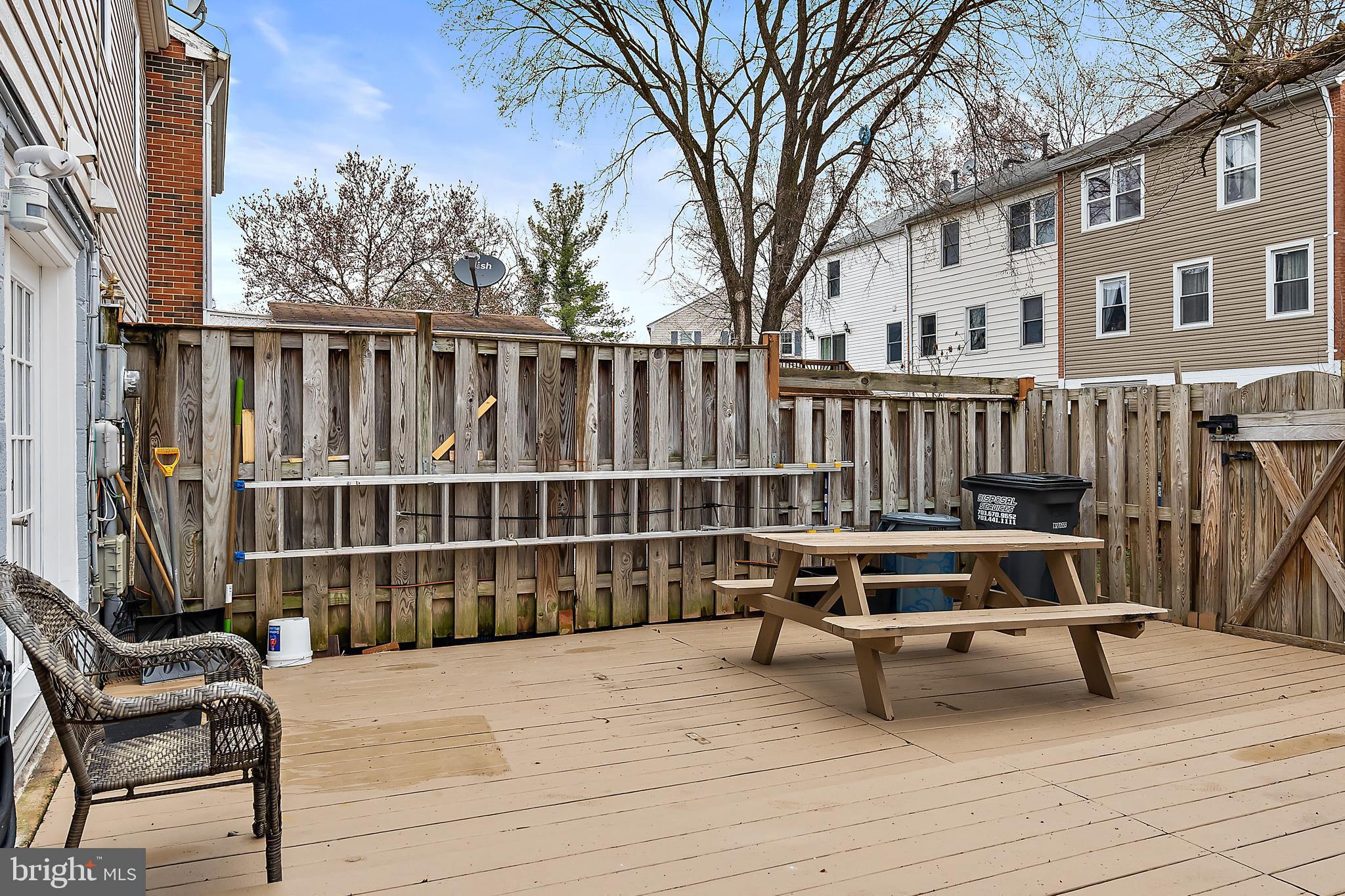9504 Covington Place Manassas, VA 20109 - Photo 32 of 40 Backyard: Deck and Fully Fenced-in.