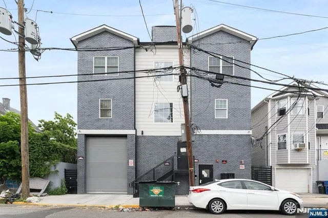 a car parked in front of a building