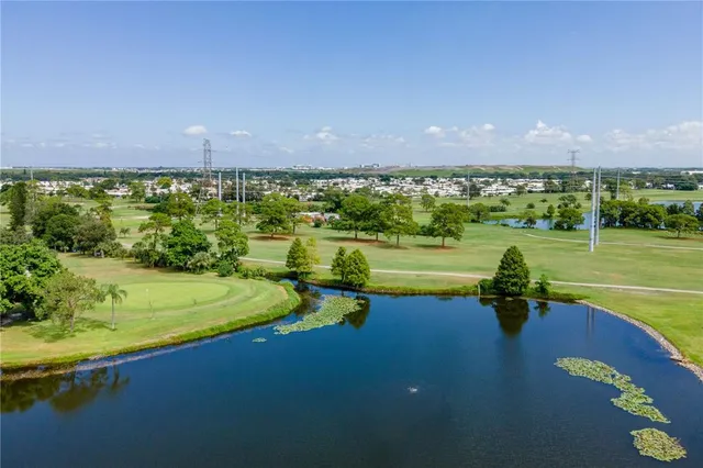 a view of a lake with a big yard