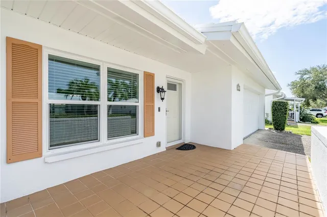 a view of a house with backyard