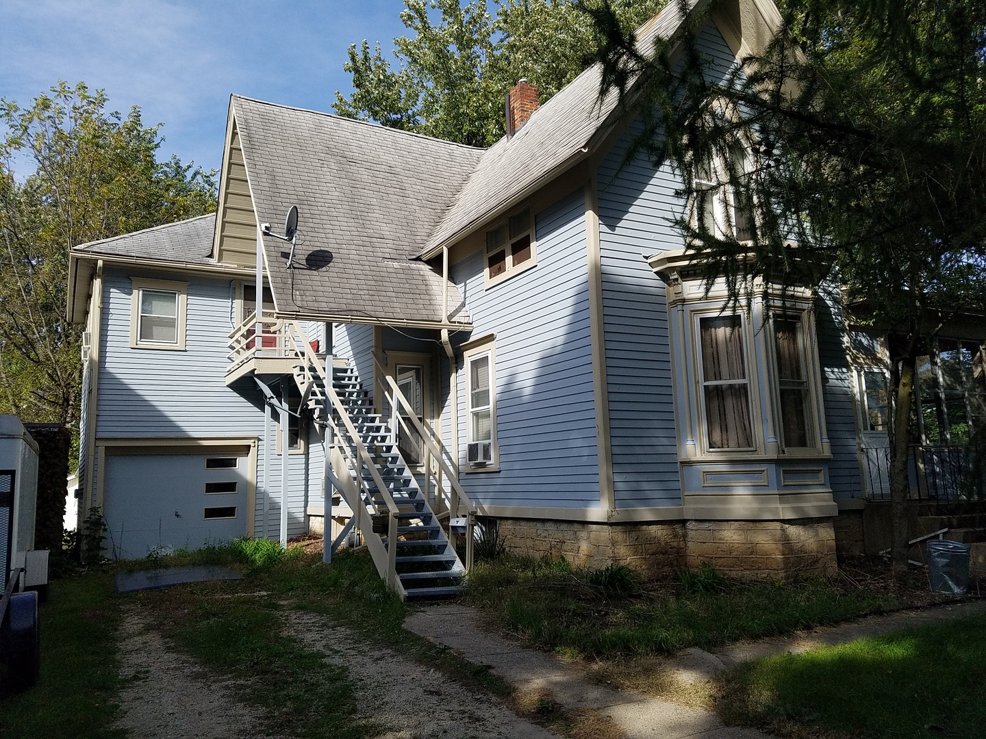 426 North 11th Street Rochelle, IL 61068 - Photo 5 of 18 a front view of a house with a yard