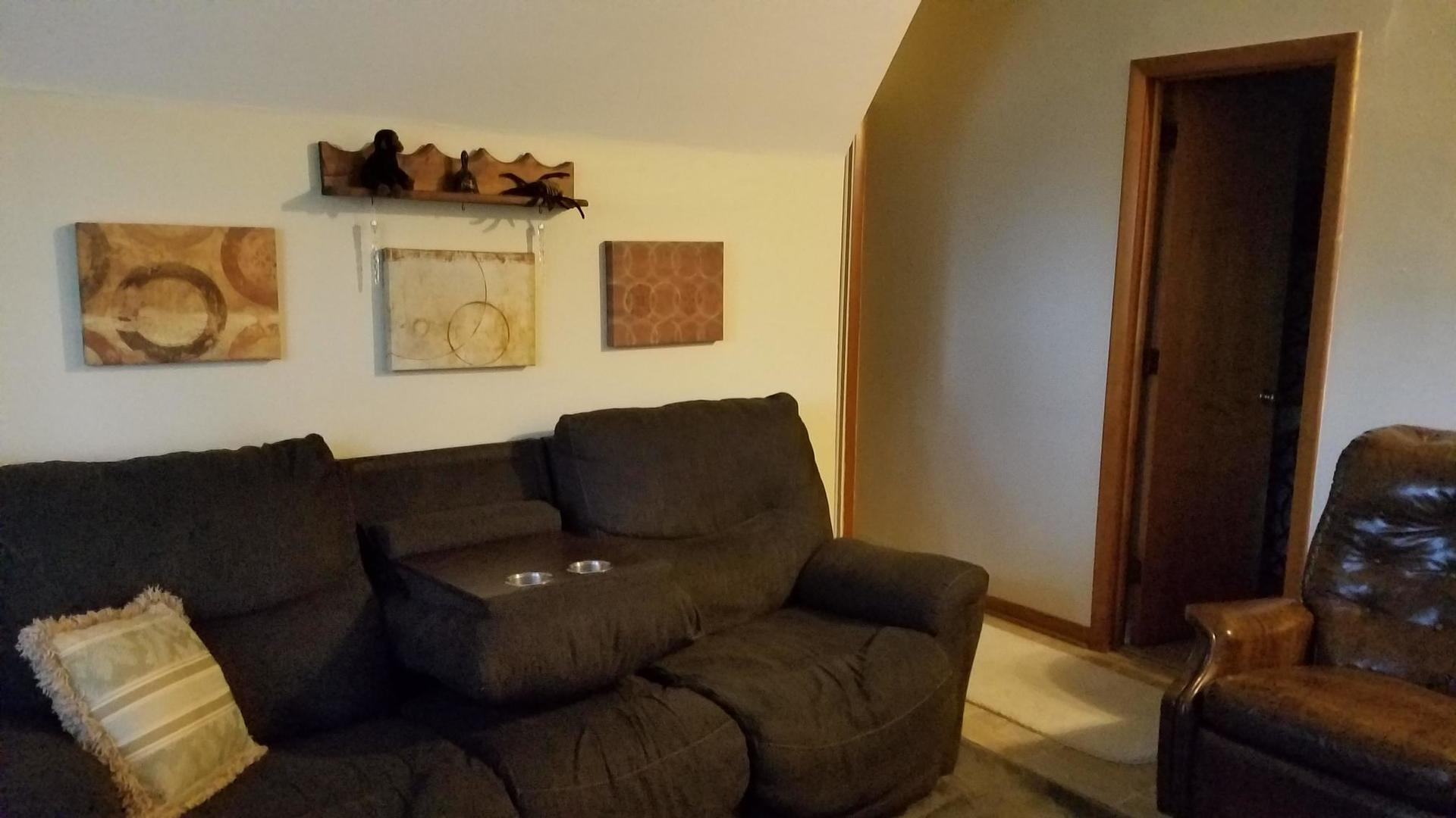 426 North 11th Street Rochelle, IL 61068 - Photo 8 of 18 a living room with furniture and a couch