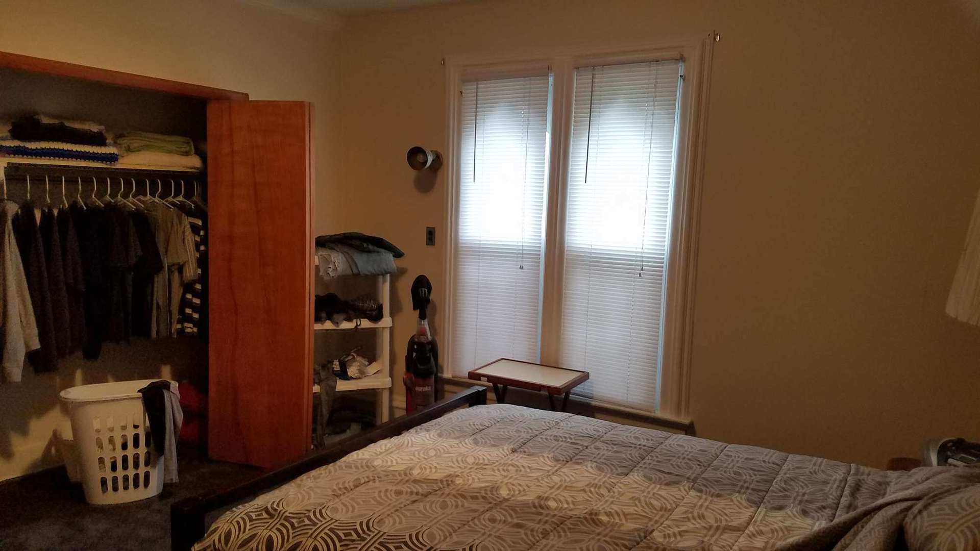 426 North 11th Street Rochelle, IL 61068 - Photo 10 of 18 a bedroom with a bed and a flat tv screen on dresser