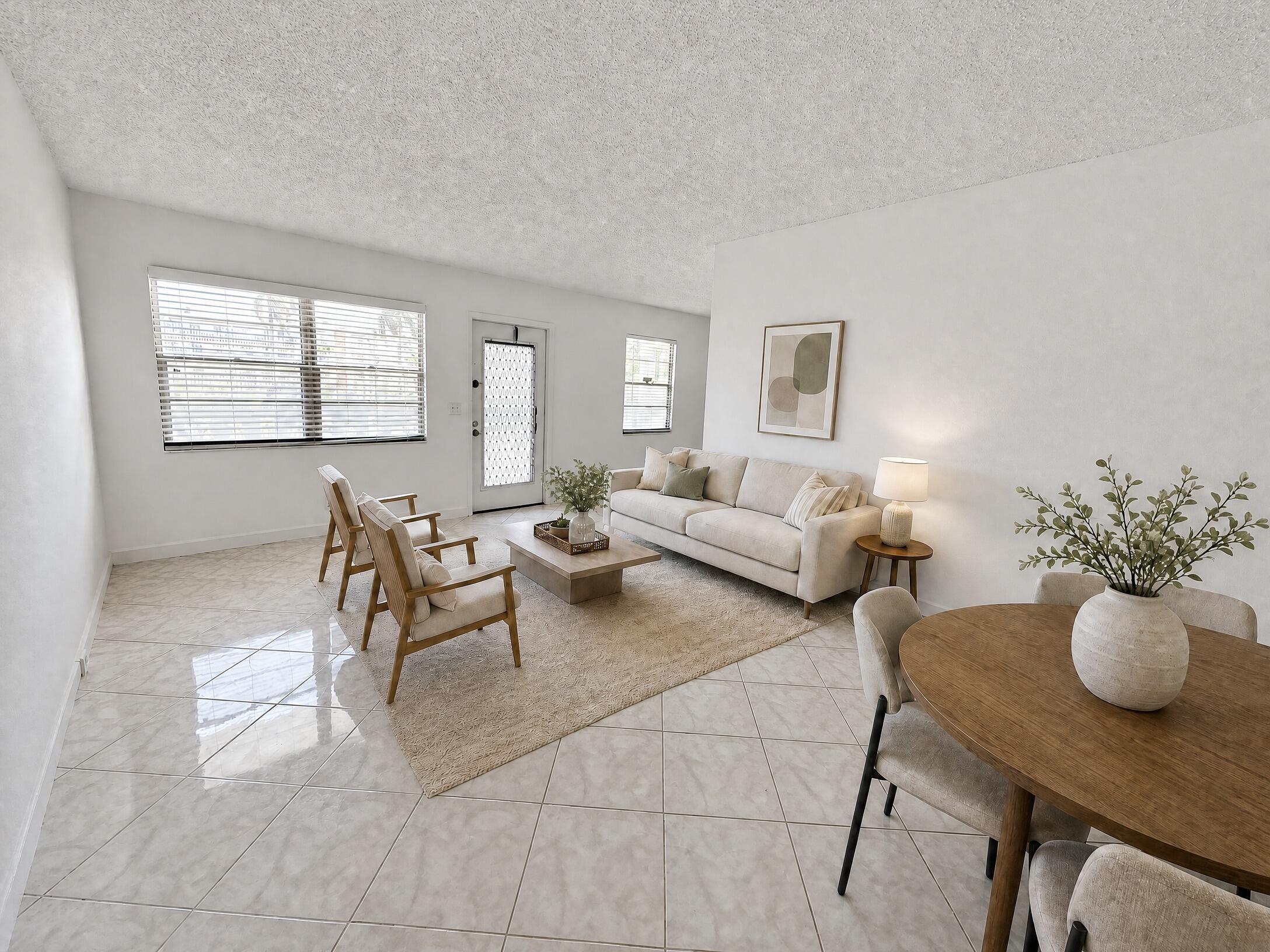 2005 Hythe A, Unit 2005 Boca Raton, FL 33434 - Photo 5 of 18 02_Living_Room_Virtually_Staged_Neutral