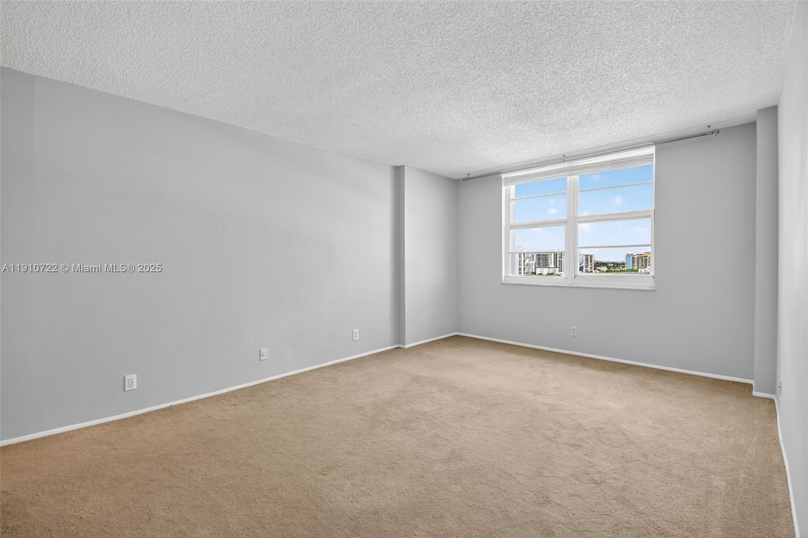 336 North Birch Road, Unit 12B Fort Lauderdale, FL 33304 - Photo 16 of 55 an empty room with windows