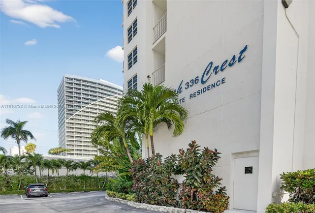 a view of a swimming pool with a lounge chairs