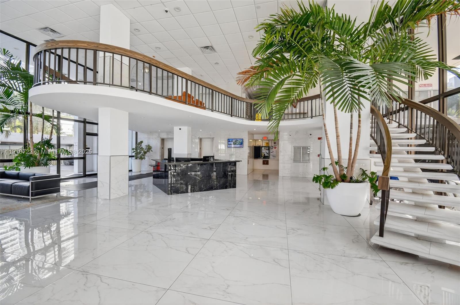 336 North Birch Road, Unit 12B Fort Lauderdale, FL 33304 - Photo 43 of 55 a living room with furniture and a potted plant