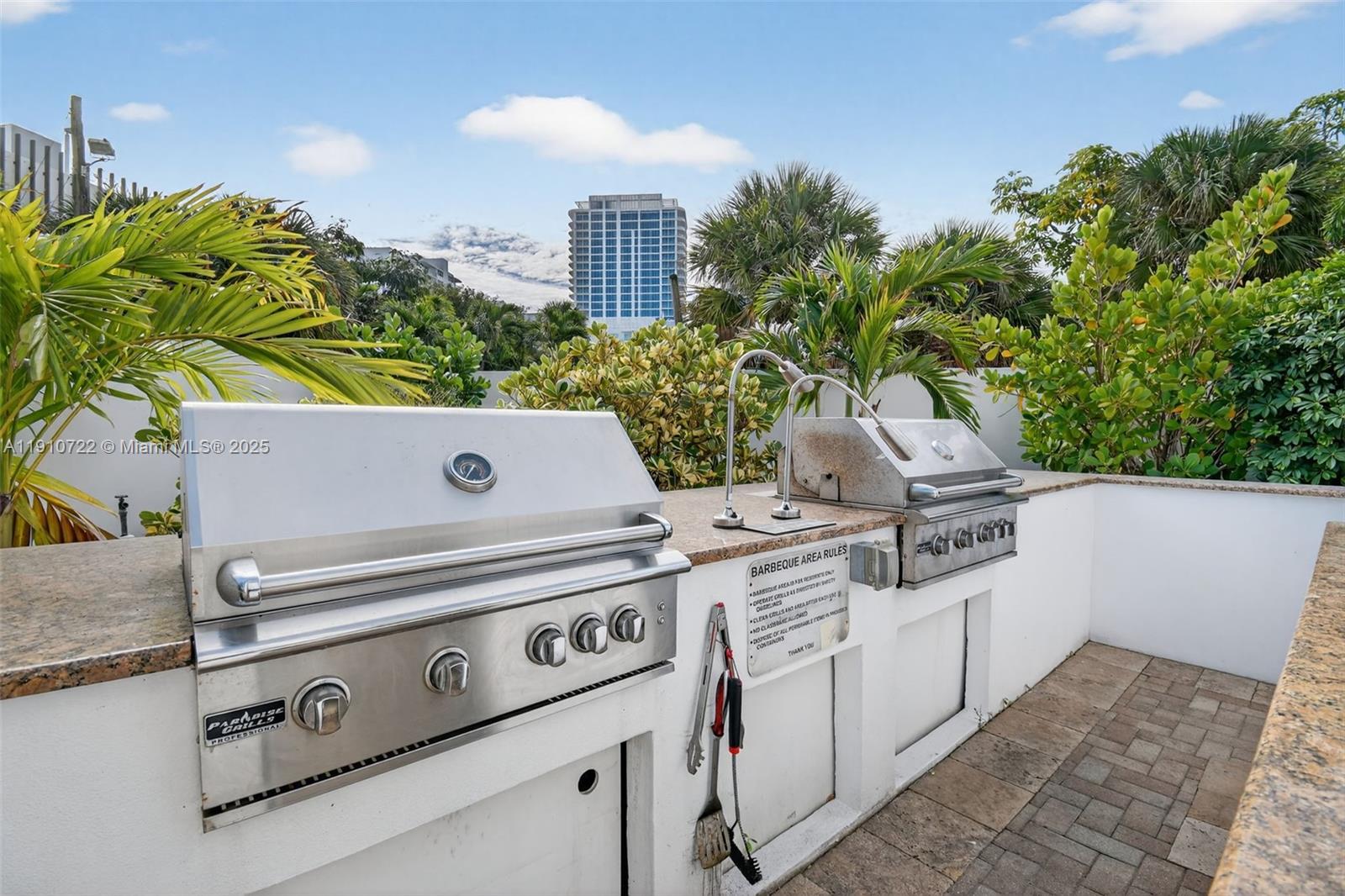 336 North Birch Road, Unit 12B Fort Lauderdale, FL 33304 - Photo 49 of 55 a view of a kitchen with a stove and a potted plant