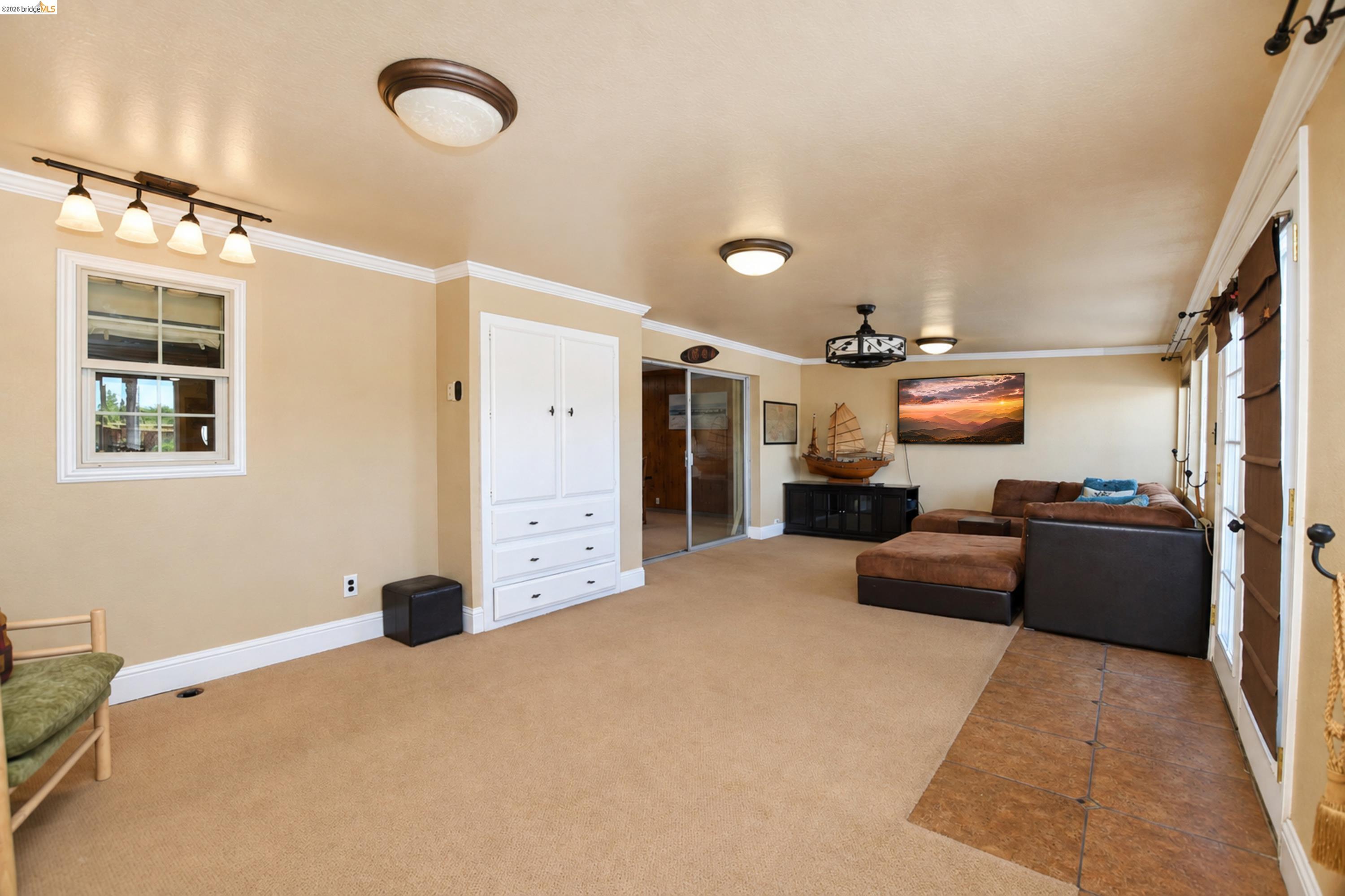 340 West Bolton Road Oakley, CA 94561 - Photo 29 of 87 Built-in cabinetry with drawers, track lighting, ceiling-mounted lighting, sliding glass door, and French doors with multiple panes