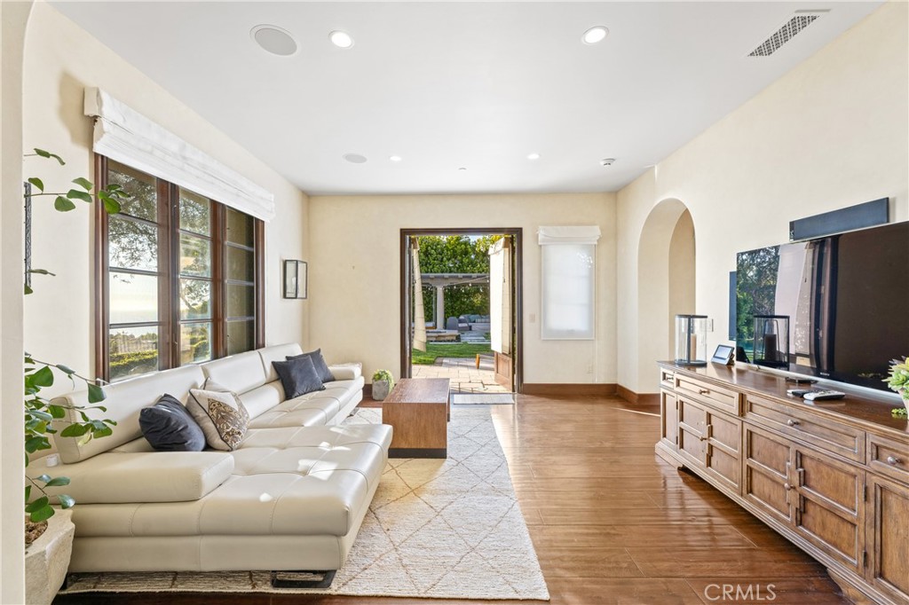 16 Shore Walk Newport Coast, CA 92657 - Photo 22 of 75 a living room with furniture large window and flat screen tv