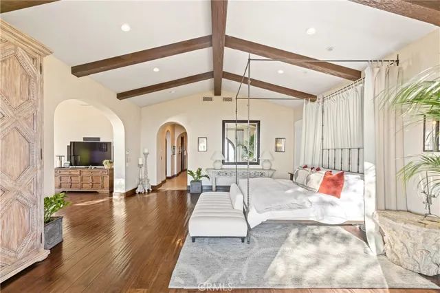 a view of a patio with table and chairs and potted plants