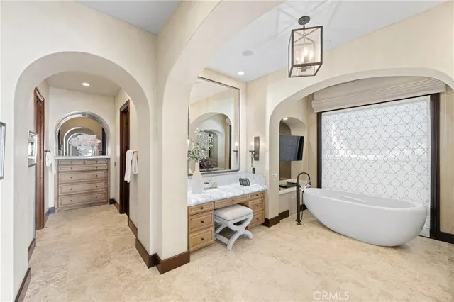 a view of a patio with a dining table and chairs