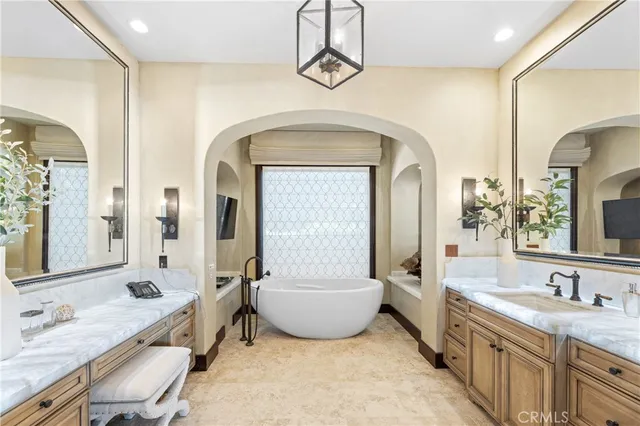 a view of backyard with swimming pool and outdoor seating