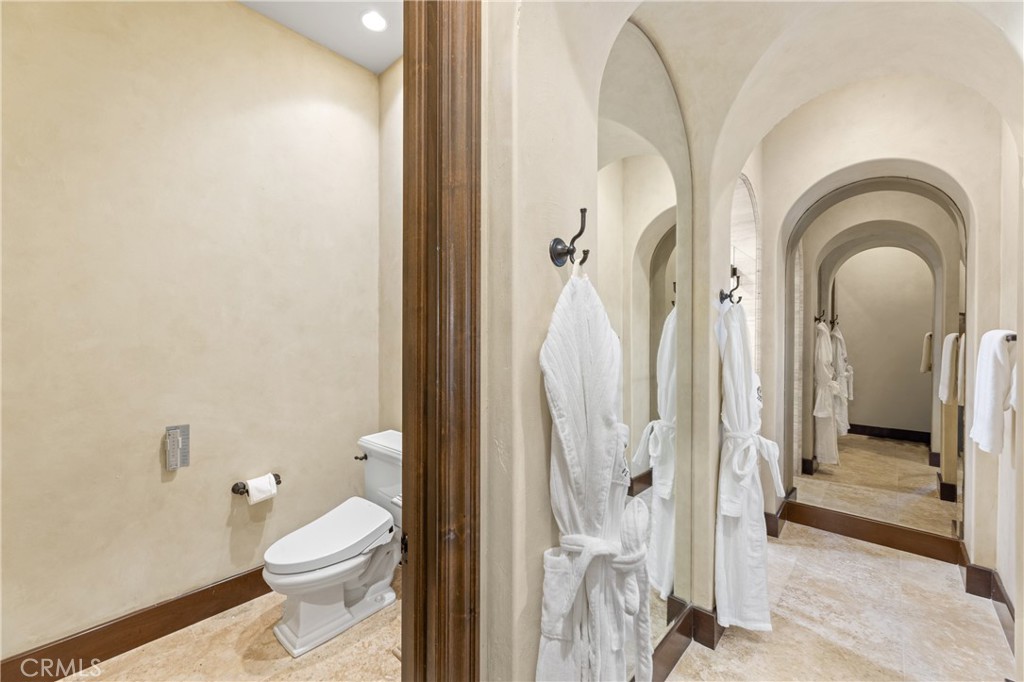 16 Shore Walk Newport Coast, CA 92657 - Photo 31 of 75 a bathroom with a toilet a sink and a shower