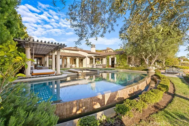 a living room with furniture a table and a flat screen tv