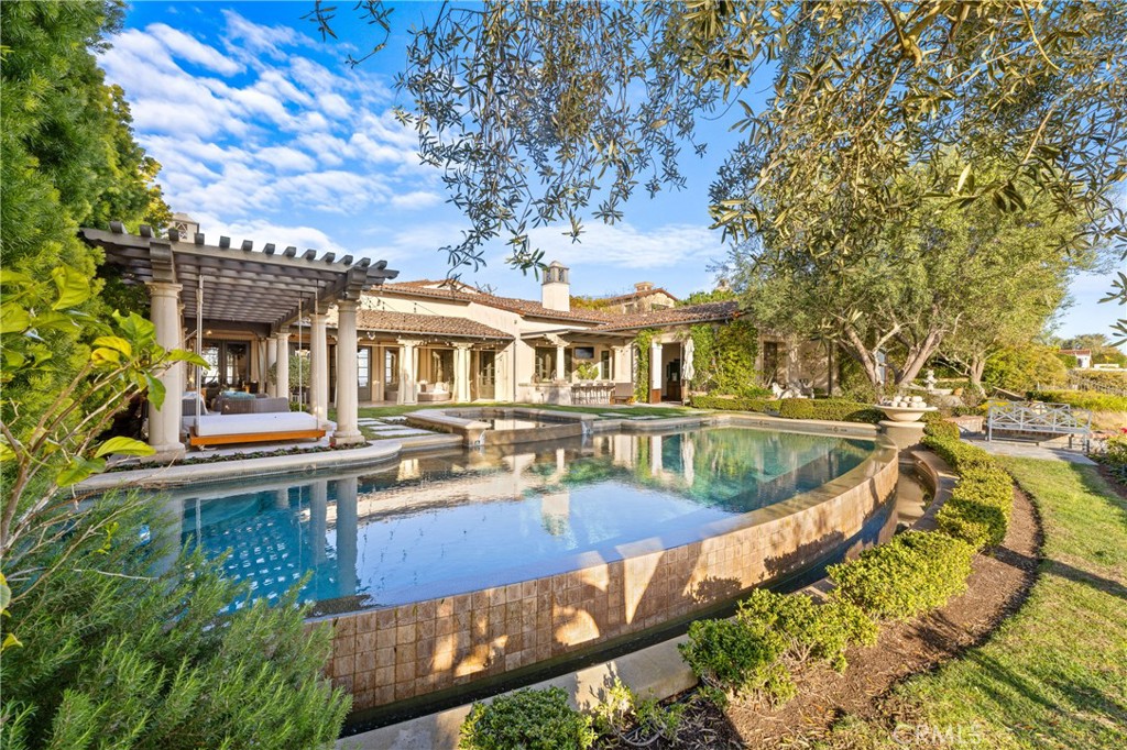 16 Shore Walk Newport Coast, CA 92657 - Photo 38 of 75 a view of a house with swimming pool