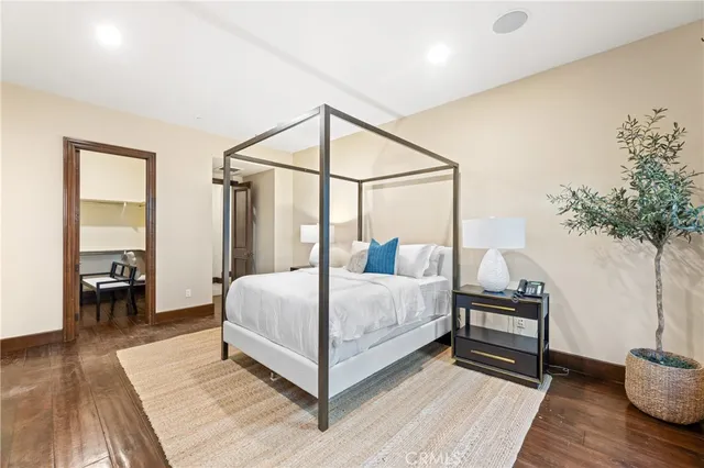 a view of a house with backyard sitting area and garden