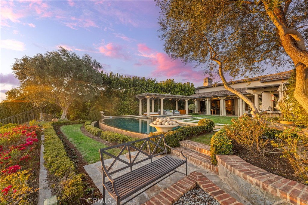 16 Shore Walk Newport Coast, CA 92657 - Photo 72 of 75 a view of a house with backyard sitting area and garden