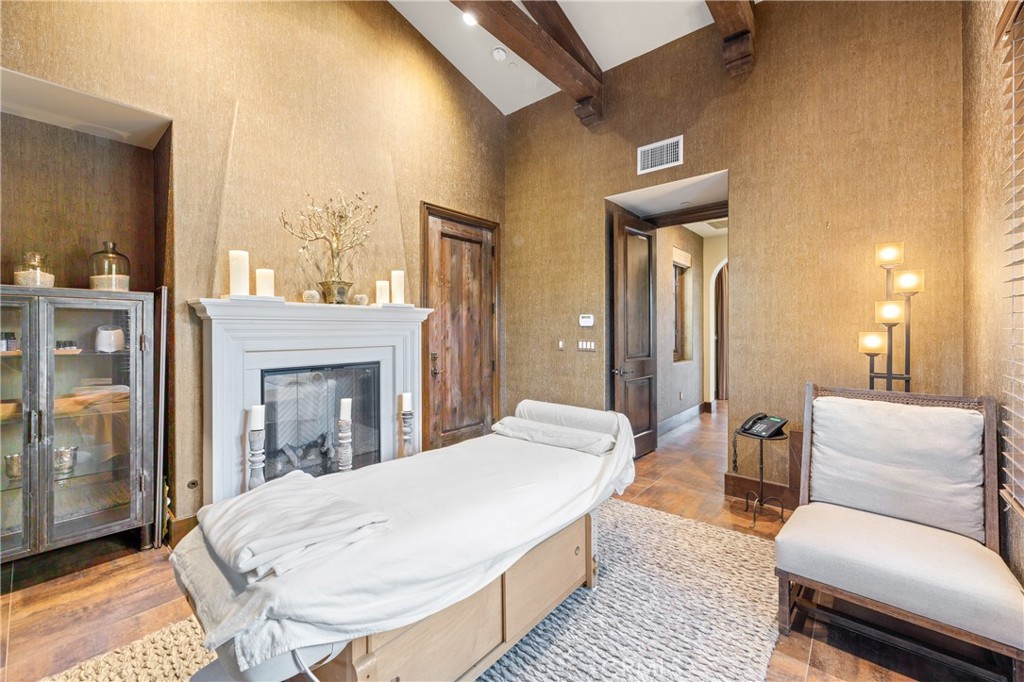 16 Shore Walk Newport Coast, CA 92657 - Photo 8 of 75 a living room with a couch and a fireplace