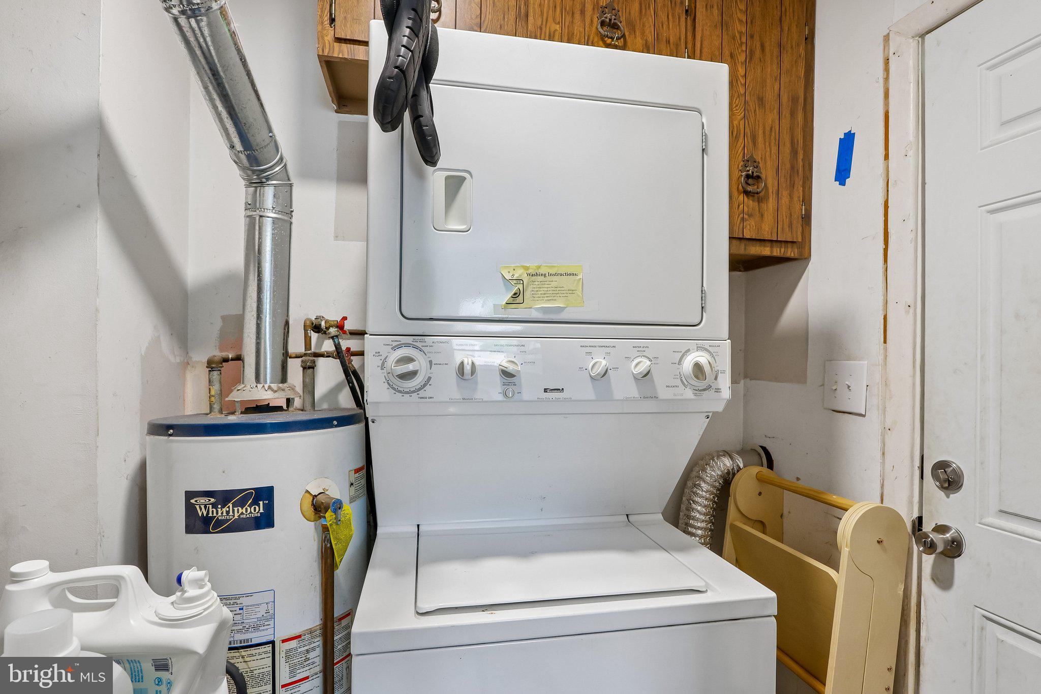 73 Burnt Tavern Road Brick, NJ 08724 - Photo 21 of 31 a bathroom with a bathtub and dryer