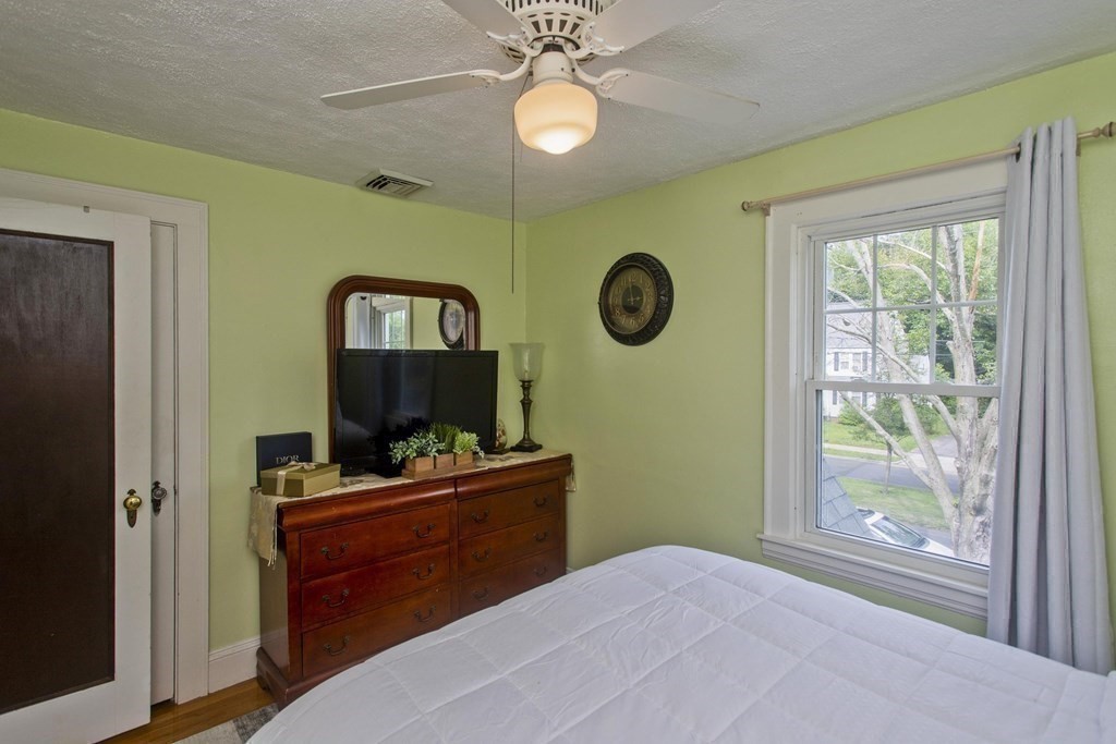 94 Gillette Avenue Springfield, MA 01118 - Photo 27 of 31 a bedroom with a bed and a window