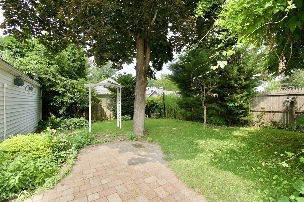 94 Gillette Avenue Springfield, MA 01118 - Photo 31 of 31 a view of a backyard with large trees