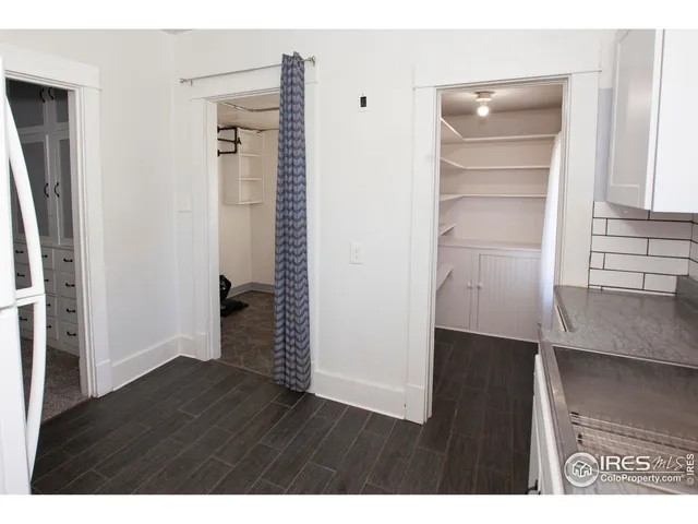 a view of an empty walk in closet