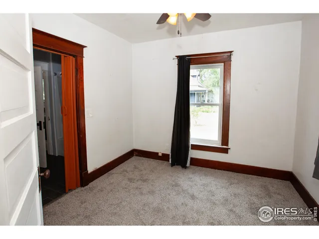 a view of an empty room with window