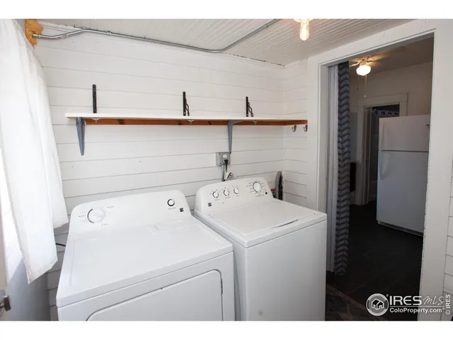 a view of a house with a big yard