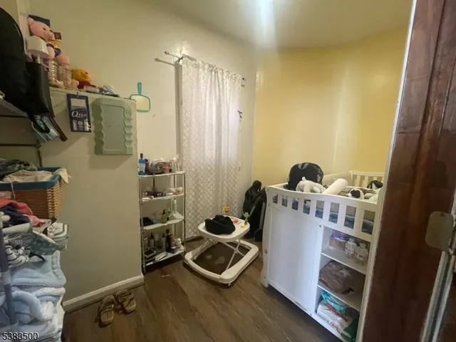 a room with furniture and gym equipment