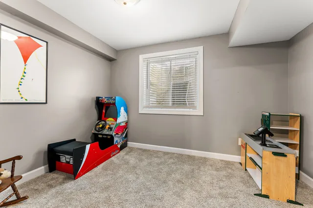 a bathroom with a sink toilet a mirror and vanity