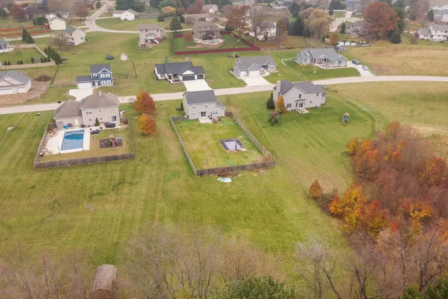 a view of a swimming pool with an outdoor space and seating area