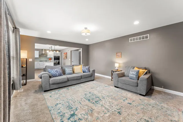 a living room with furniture and a couch