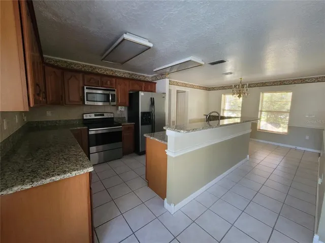 a view of a swimming pool with an outdoor space