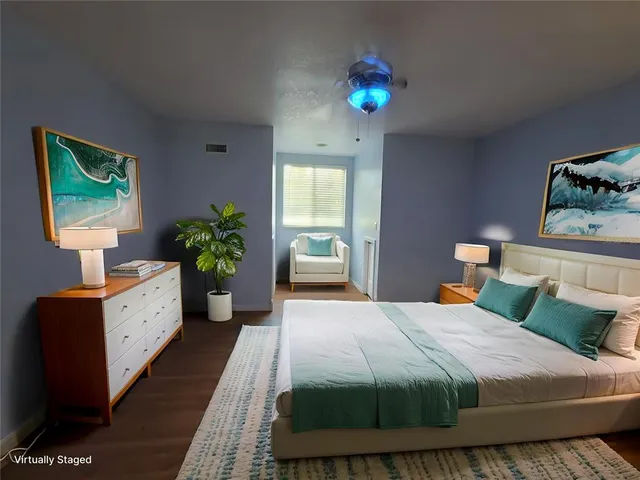 a view of a swimming pool with a yard