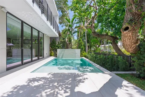 a view of a building with a garden