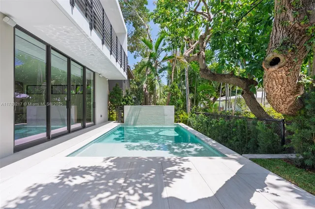 a view of a building with a garden