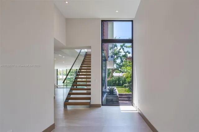 a view of room with furniture and stairs
