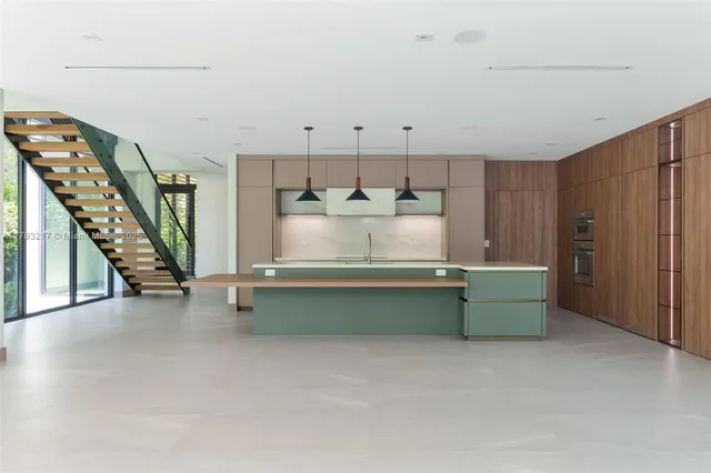 a view of a kitchen with a sink