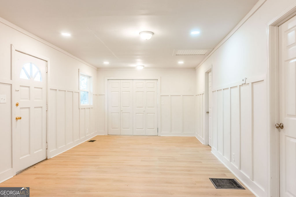 80 Menefee Street Palmetto, GA 30268 - Photo 5 of 30 a view of a hallway with wooden floor