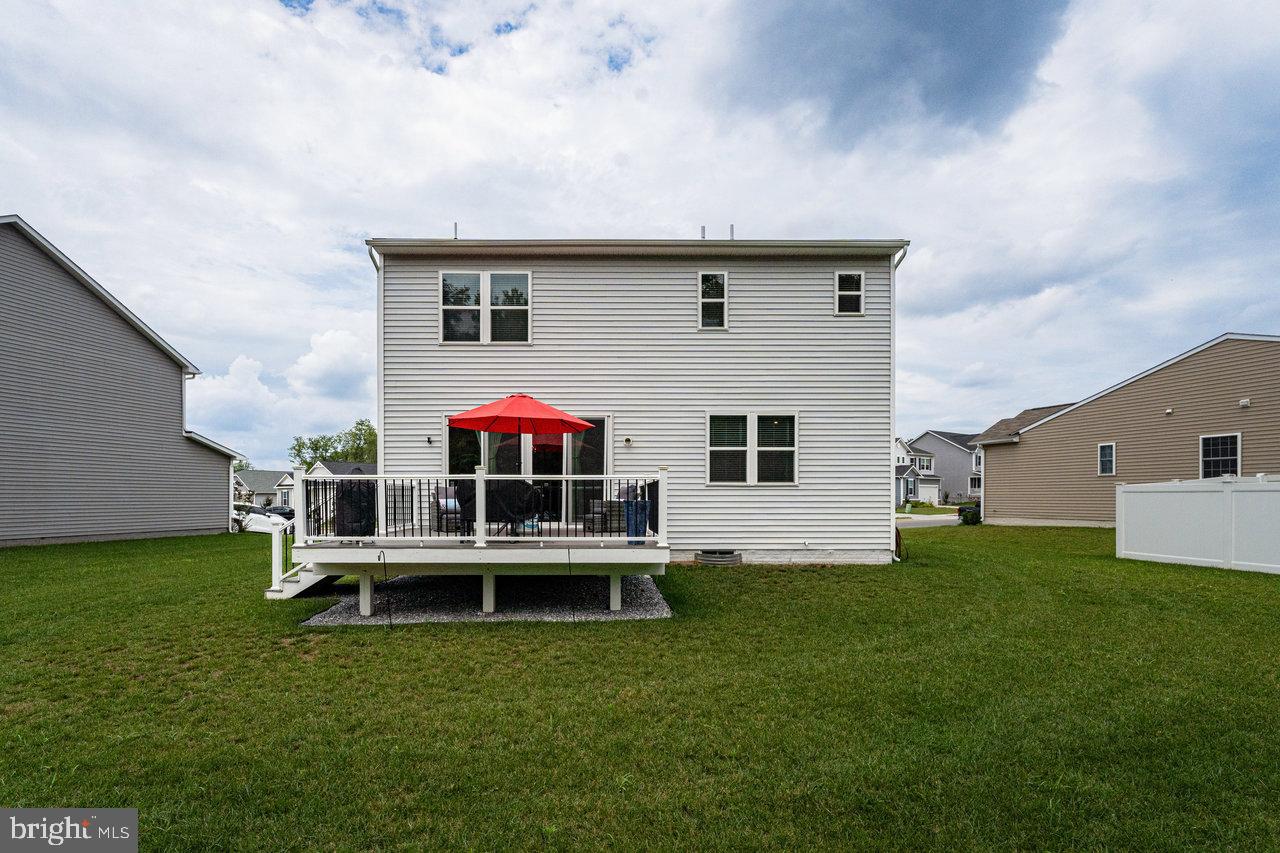 12301 Fallen Timbers Circle Hagerstown, MD 21740 - Photo 2 of 43 a front view of house with yard and patio